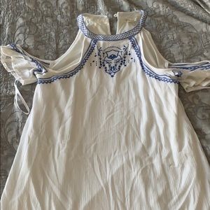 White dress with blue detailing